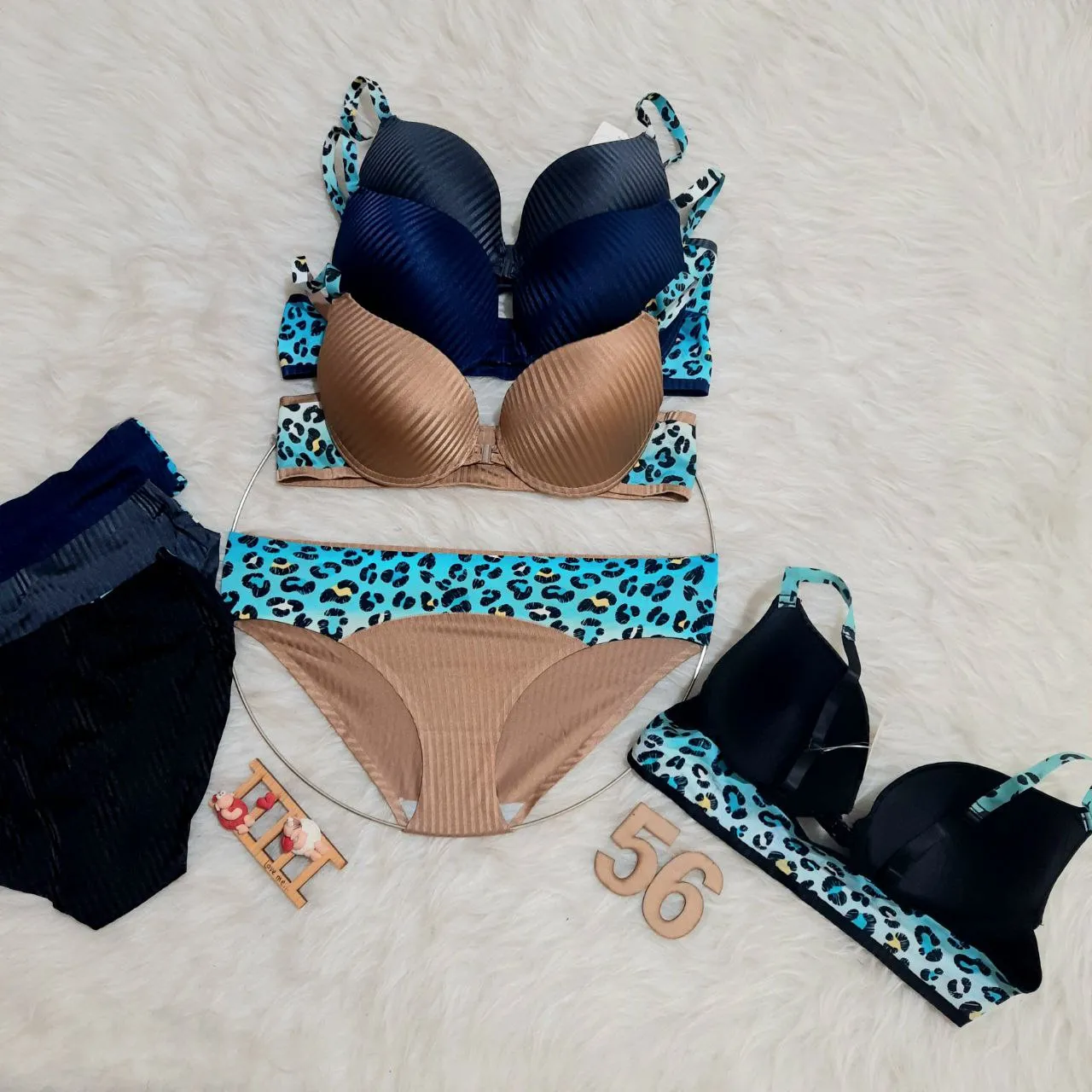 56 1 ست شورت و سوتین اسفنجی لیزری زنانه کد 56(بسته چهارتایی)